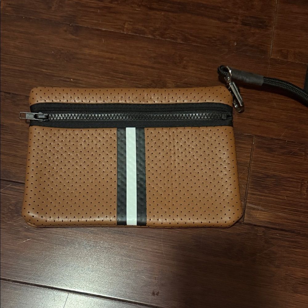 Brown Perforated Coated Neoprene Wristlet with Black and White Stripe